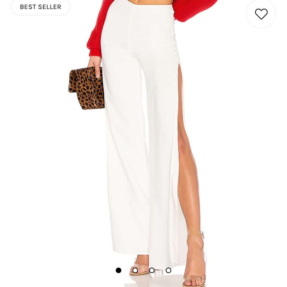 Brand new with tag. Take It Higher Pant in Ivory
Lovers and Friends